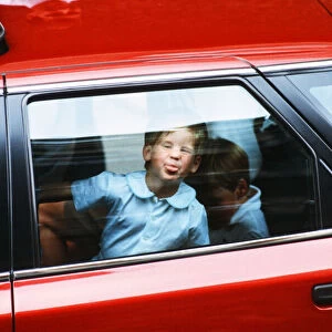 Princes William and Harry leaving hospital after visiting the Duchess of York