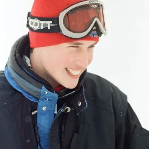 Print of Prince William on a skiing holiday with his father and brother Print of Prince William on a skiing holiday with his father and brother