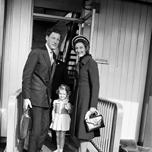 Princess Alexandra and her husband Angus Ogilvy at Heathrow Airport with their daughter