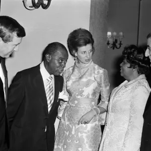 Princess Alexandra meets Louis Armstrong at a private party at the Savoy Hotel, London Princess Alexandra meets Louis Armstrong at a private party at the Savoy Hotel, London