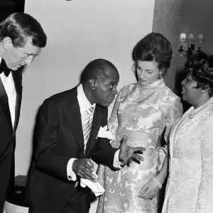 Print of Princess Alexandra meeting Louis Armstrong at a private party