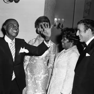 Princess Alexandra meets Louis Armstrong at a private party at the Savoy Hotel, London Princess Alexandra meets Louis Armstrong at a private party at the Savoy Hotel, London