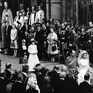 Princess Anne and Captain Mark Phillips walking down the aisle after their wedding