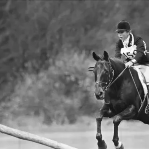 Print of Princess Anne competing in a showjumping event at Windsor Great Park