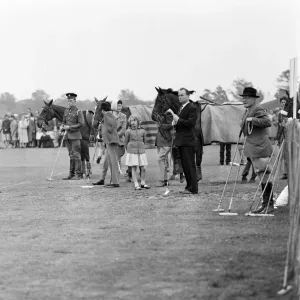 Princess Anne watches her father play polo at Windsor Great Park. 17th May 1959 Princess Anne watches her father play polo at Windsor Great Park. 17th May 1959