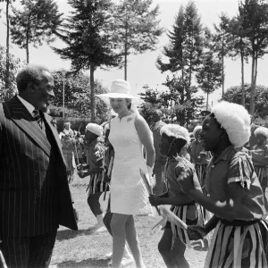 Princess Anne watches a traditional dance of welcome alongside the President of Kenya