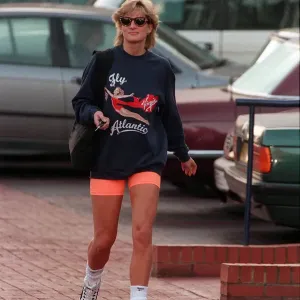 Print of Princess Diana wearing pink cycling shorts