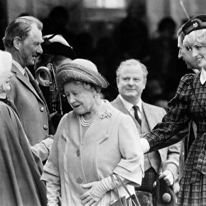Princess Diana helps the Queen Mother at the annual Braemar Highland Games near