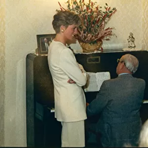 Princess Diana, HRH The Princess of Wales, sings along to the song "