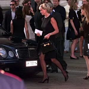 Princess Diana leaves a memorial service for slain Italian fashion designer Gianni