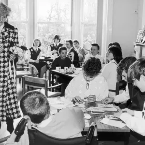 Princess Diana, Princess of Wales seen here talking to handicapped