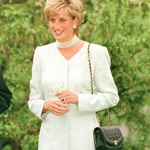 Princess Diana smiles and waves to the students of Northwestern University in Evanston