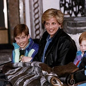 Princess Diana with her two sons Prince William and Prince Harry about to go on a sleigh
