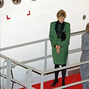 Princess Diana, wearing a green jacket and skirt suit, pictured at the naming ceremony of