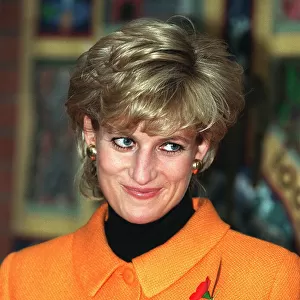 Princess Diana, wearing oragne jacket, poppy and black jumper visits Liverpools Womens