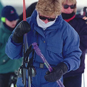 Princess Diana wearing ski-ing outfit and sunglasses during a ski-ing holiday with her