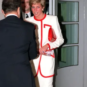 Print of Princess Diana in a white suit with red trim