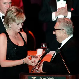 Princess Diana wears a black evening dress whilst receiving an award in New York Princess Diana wears a black evening dress whilst receiving an award in New York