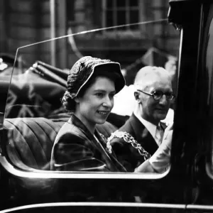 Princess Elizabeth smiles at the crowds along the route during her visit to the West Princess Elizabeth smiles at the crowds along the route during her visit to the West
