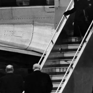 Princess Elizabeth steps from her plane after landing at London Airport after being