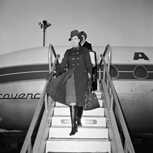 Princess Grace arrives at Heathrow Airport today from Monaco