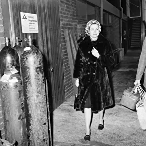 Princess Grace of Monaco at Heathrow Airport en route from America to Paris
