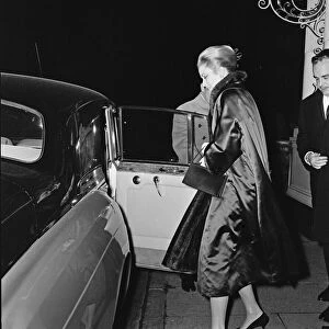 Princess Grace of Monaco and her husband Prince Rainier leaving the Connaught Hotel