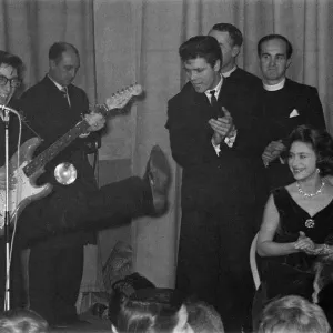 Princess Margaret and the Bishop of Bath and Wells clap their hands whilst listening to Princess Margaret and the Bishop of Bath and Wells clap their hands whilst listening to