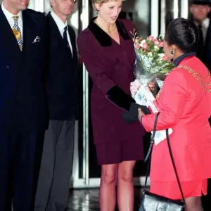 PRINCESS OF WALES WEARING A PURPLE SKIRT SUIT RECEIVING FLOWERS OUTSIDE THE NATIONAL PRINCESS OF WALES WEARING A PURPLE SKIRT SUIT RECEIVING FLOWERS OUTSIDE THE NATIONAL