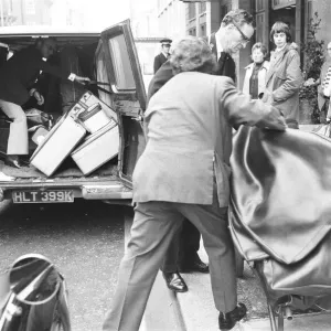 Prior to singer Frank Sinatra departure from Claridges Hotel a small van arrives