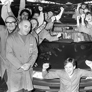 Production line workers at the Peugeot factory at Ryton are seen here celebrating the Car