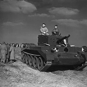 A prototype Cromwell tank is put through its pace for King George VI