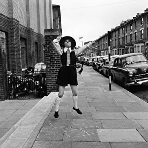 Prunella Scales, actress aged 29 years old, dressed as a naughty schoolgirl