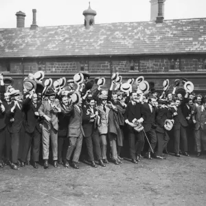 Public School Boys in the grounds of the Chatham Hospital Manchester cheering as Public School Boys in the grounds of the Chatham Hospital Manchester cheering as
