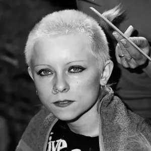Punk girl Julie Brandon having her hair cut by her mother at their home in Thame Punk girl Julie Brandon having her hair cut by her mother at their home in Thame