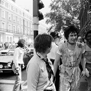 Punk Rocker and Teddy Boy youths in Kings Road, London. Pictured, a punk