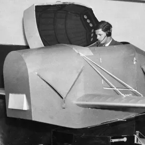 A pupil emerging from the Link trainer used for initial instruction at an RAF training A pupil emerging from the Link trainer used for initial instruction at an RAF training