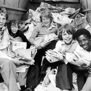 Black and white photograph print of schoolchildren collecting newspapers Black and white photograph print of schoolchildren collecting newspapers