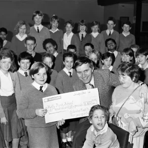 Pupils from Salendine Nook High School, present a cheque for 850 poounds to John Proctor Pupils from Salendine Nook High School, present a cheque for 850 poounds to John Proctor