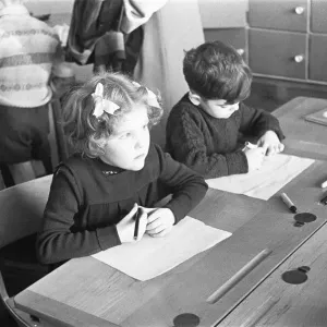 Pupils at South Mead School, Southfield, Wimbledon during an art lesson Pupils at South Mead School, Southfield, Wimbledon during an art lesson