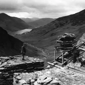 Print of Quarrying green slate in the Lake District Print of Quarrying green slate in the Lake District