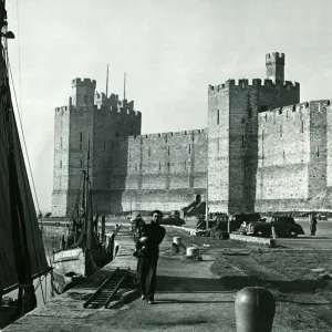 The quay outside the walls of Caernarfon Castle. Inside the castle walls is where