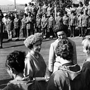 The Queen chats to girls of the Outward Bound School at Aberdovey. With her is Miss A