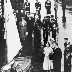 The Queen and The Duke of Edinburgh receiving the yacht presented to Prince Charles by The Queen and The Duke of Edinburgh receiving the yacht presented to Prince Charles by
