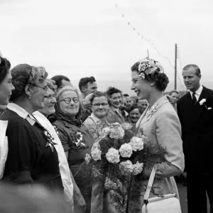 Queen Elizabeth chats with fisher Women at Peel Isle of man with Prince Philip Duke of Queen Elizabeth chats with fisher Women at Peel Isle of man with Prince Philip Duke of