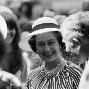 Queen Elizabeth II attends a garden party at Holland House Hostel to mark the Golden Queen Elizabeth II attends a garden party at Holland House Hostel to mark the Golden