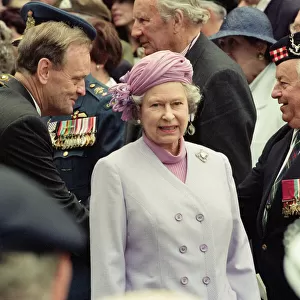 Queen Elizabeth II attends the unveiling of the Canadian War Memorial in Green Park