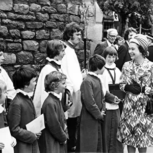 Queen Elizabeth II chats to the choirboys during a visit to Hexham Abbey 1st July