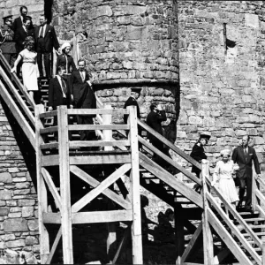 Queen Elizabeth II and The Duke of Edinburgh lead the party down the wooden steps as Queen Elizabeth II and The Duke of Edinburgh lead the party down the wooden steps as