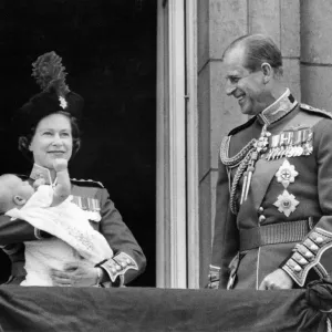 Queen Elizabeth II holds her youngest son Prince Edward in her arms as she stands with Queen Elizabeth II holds her youngest son Prince Edward in her arms as she stands with